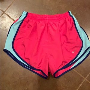 Pink and blue Nike women’s tempo running shorts